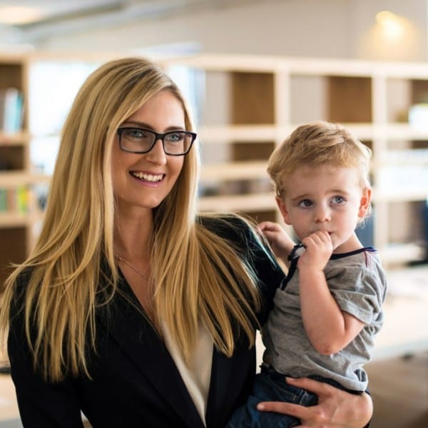 Happy business woman with son talking to South Carolina Alcohol Law Attorneys, South Carolina Business Law Attorneys, South Carolina Estate Planning Attorneys